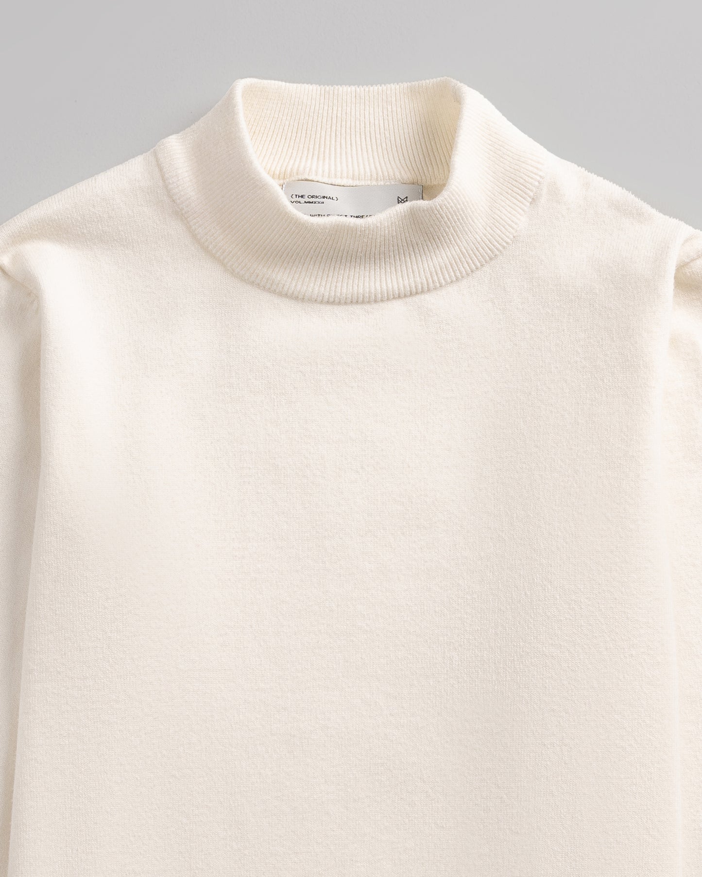 White Mock Neck Knitted Sweater